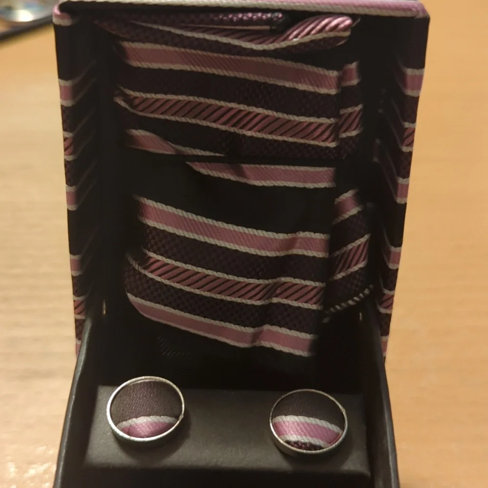 Cuff links with pocket square in a box